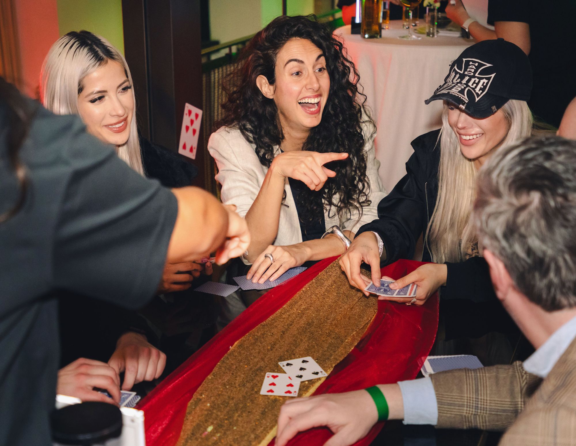 Guests playing cards at the casino games night